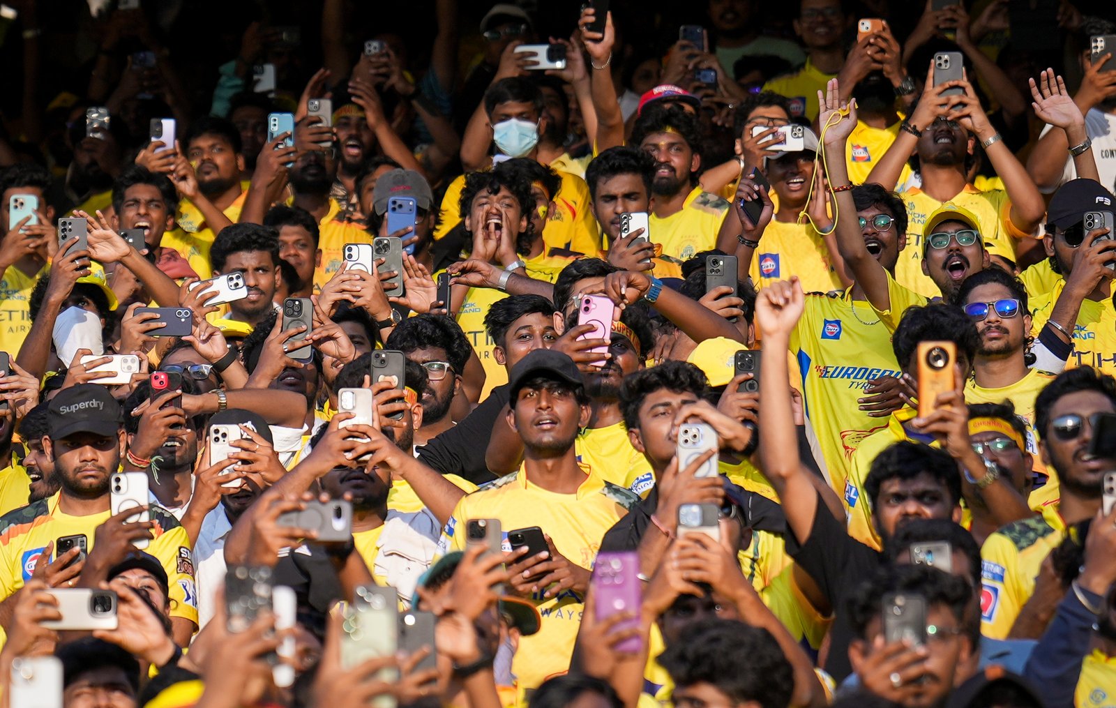 Fans capturing the moment, match day